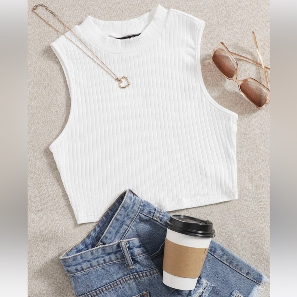4/15$ Solid ribbed knit top in white